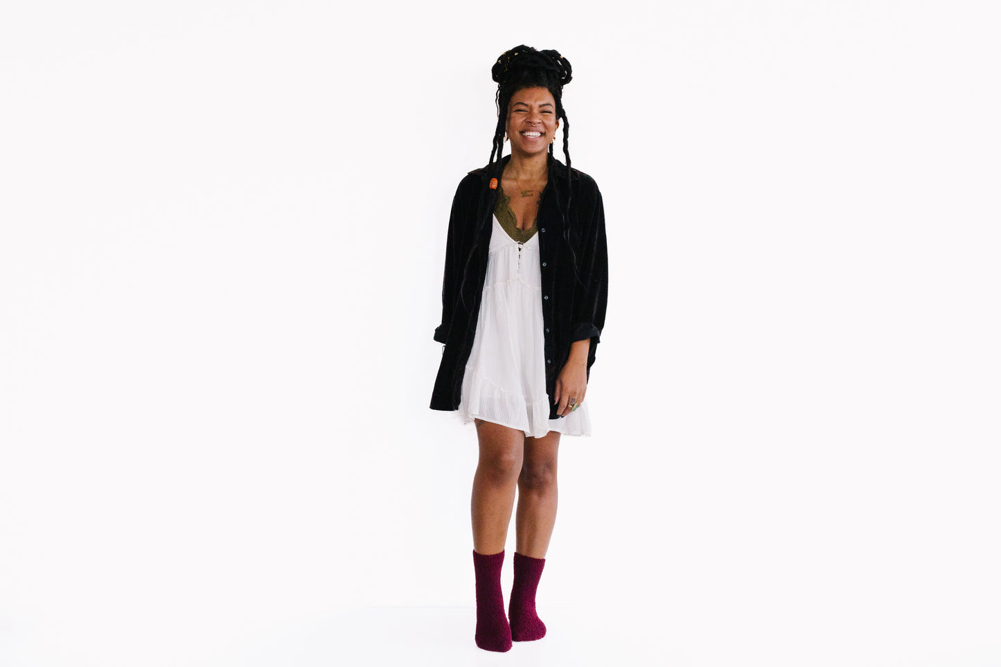 Vineyard | Valley Harvest Purple Cozy Socks | Fuzzy Socks | Cozy Socks for a Cause-on smiling model